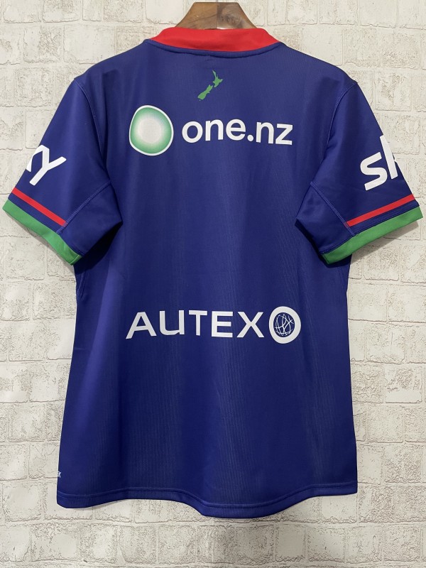 25/26 New Zealand Warriors Navy Blue with Green and Red Diagonal Stripes and Circular Gradient Heritage Jersey